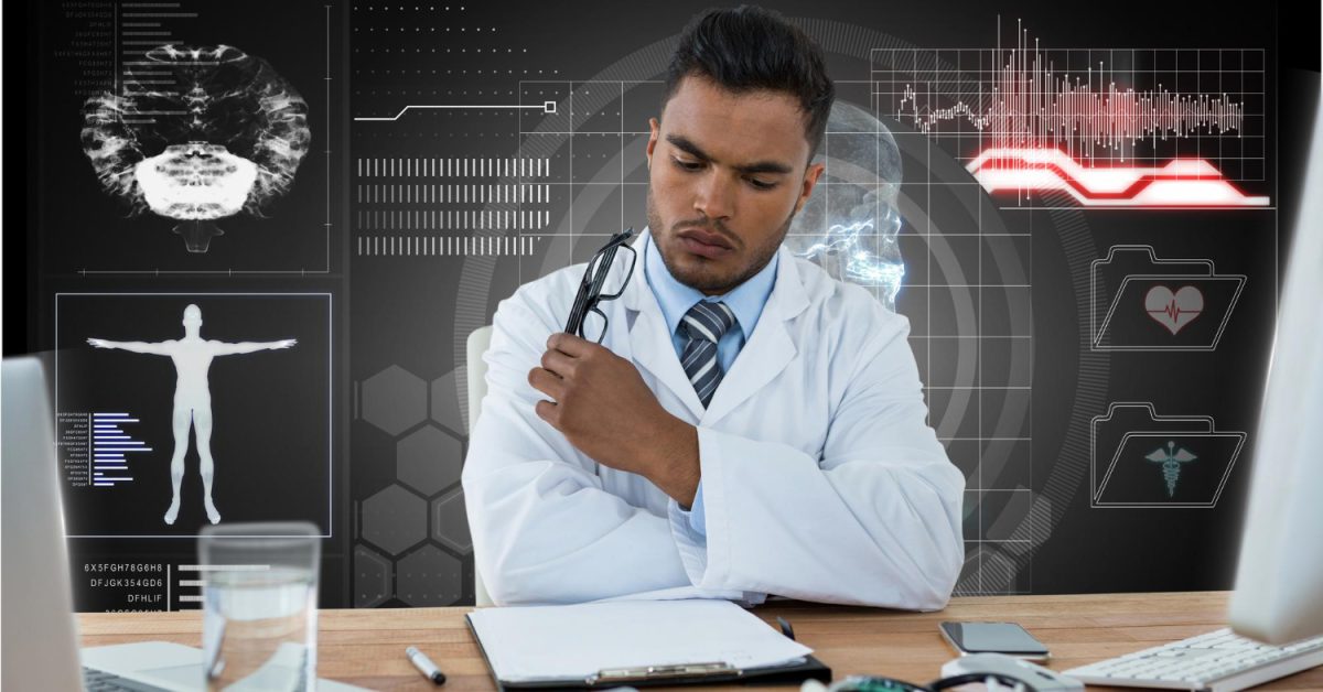 Doctor accessing electronic health records on hospital computer